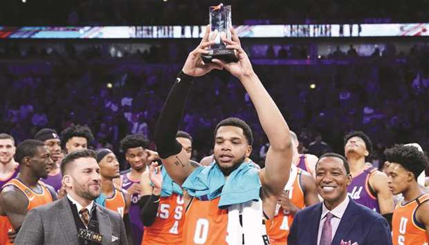 USAu2019s Miles Bridges hoists the MVP trophy at the NBA Rising Stars game at the United Center in Chicago. (USA TODAY Sports)