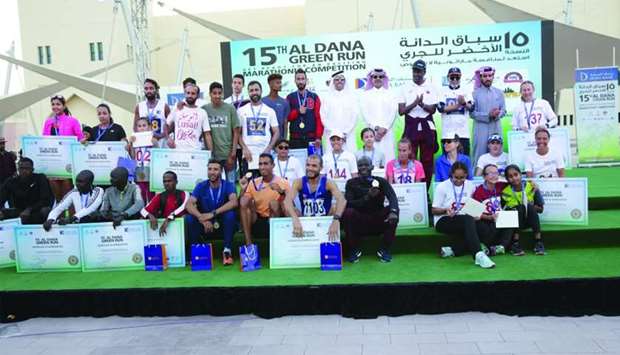Officials with the winners of 15th edition of the Al Dana Green Run.rnrn