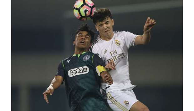 Real Madrid and Sporting Clube de Portugal players vying for the ball during their in Group D match at the Al Kass International Cup at the Aspire Academy yesterday. PICTURE: Jayaram