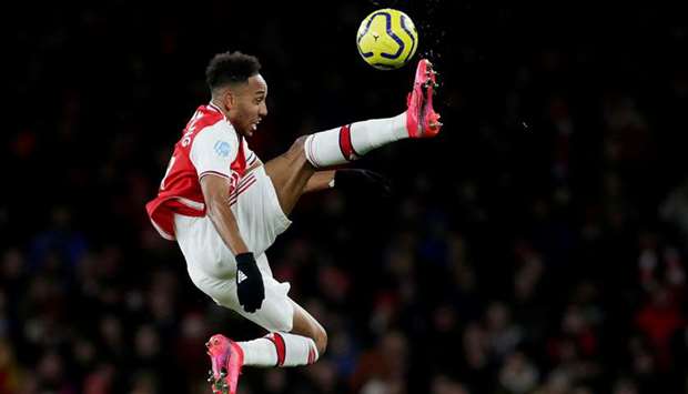 Arsenalu2019s Pierre-Emerick Aubameyang in action during their game against Newcastle United in London yesterday. (Reuters)