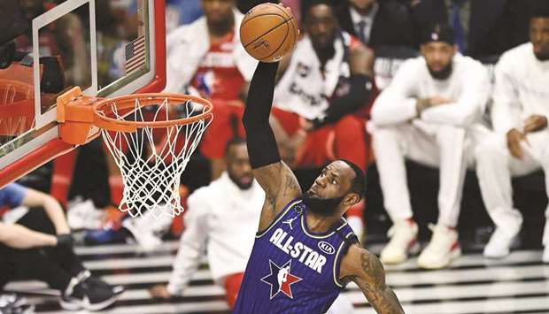 LeBron James of Team LeBron dunks the ball in the third quarter against Team Giannis during the All-Star Game at the United Center in Chicago, Illinois, on Sunday. (AFP)