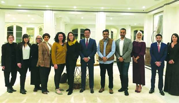 The delegates pose for group photo after an event.rnrn