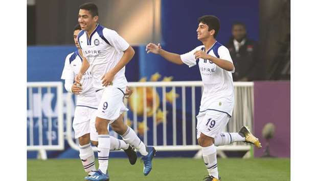 Aspire Academy players celebrate after scoring a goal against Glasgow Rangers during the Al Kass International Cup yesterday. PICTURE: Jayaram
