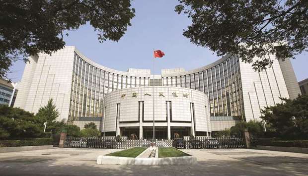 The Peopleu2019s Bank of China headquarters in Beijing. The PBoC offered 200bn yuan ($29bn) of one-year medium-term loans to commercial lenders yesterday. The rate was lowered by 10 basis points to 3.15%, the lowest since 2017.