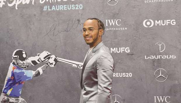 Lewis Hamilton poses on the red carpet prior to the 2020 Laureus World Sports Awards ceremony in Berlin on Monday. (AFP)