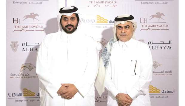 Qatar Racing and Equestrian Club CEO Nasser Sherida al-Kaabi and Al Emadi Enterprises CEO Mohamed al-Emadi pose during a press conference at Al Hazm in Doha yesterday. PICTURE: Juhaim