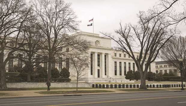 The US Federal Reserve building in Washington, DC. The Fed has doled out tens of billions to calm the short-term lending markets after they went haywire in September.