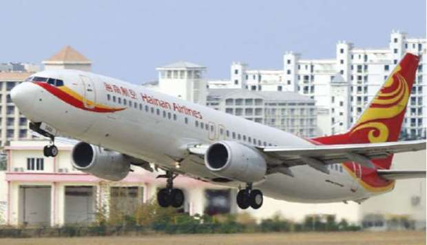 A Hainan Airlines plane takes off from the Sanya Phoenix International Airport in Sanya, China.