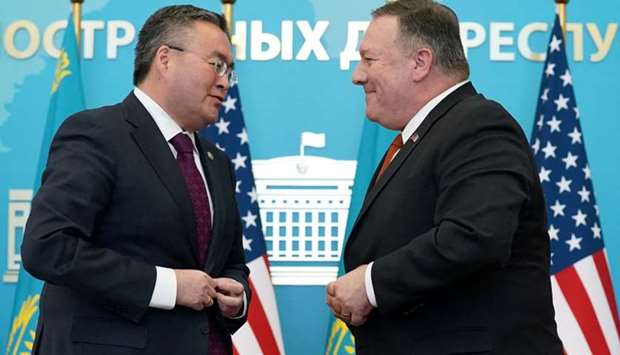 US Secretary of State Mike Pompeo buttons his jacket after holding a joint news conference with Kazakh Foreign Minister Mukhtar Tleuberdi at the Ministry of Foreign Affairs in Nur-Sultan, Kazakhstan