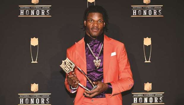 Lamar Jackson poses for a photo after receiving the Most Valuable Player award at Adrienne Arsht Center. PICTURE: USA TODAY Sports