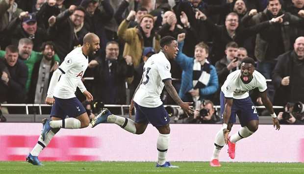 Tottenham Hotspuru2019s Steven Bergwijn (centre) celebrates with teammates after scoring against Manchester City during their English Premier League match at Tottenham Hotspur Stadium in London, United Kingdom, yesterday. (AFP)