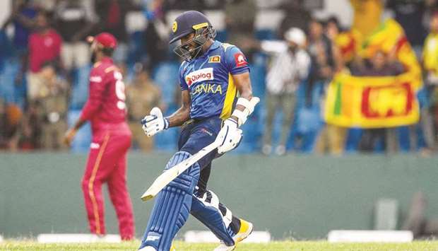 Sri Lankau2019s Wanindu Hasaranga celebrates their ODI victory over West Indies in Colombo yesterday. (AFP)