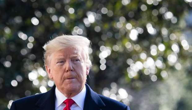 US President Donald Trump speaks to the press prior to departing on Marine One from the South Lawn of the White House in Washington, DC