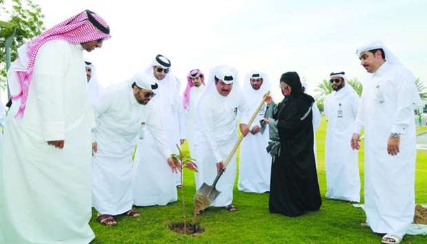 MME officials and CMC member Sheikha al-Jufairi taking part in the campaign