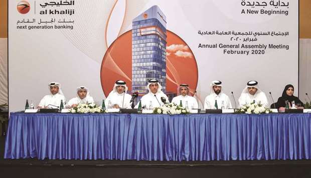 HE Sheikh Hamad (fourth left) with other Al Khaliji directors at the banku2019s  Annual General Meeting of shareholders at the Marriott Marquis Hotel, City Center Doha yesterday.