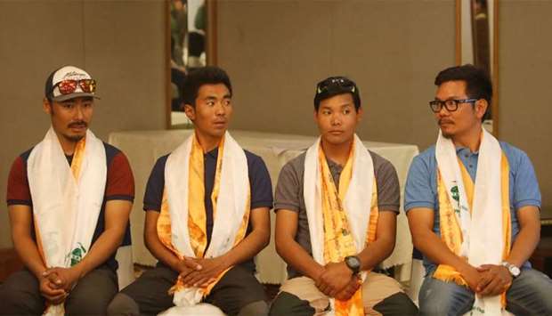 Halung Dorchi Sherpa, Pasang Nurbu Sherpa, Ming Temba Sherpa and Tashi Lakpa Sherpa attend a news conference organised before heading to attempt the record for the winter Everest expedition in 5 days, in Kathmandu