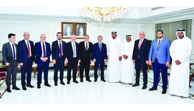 Qatar Chamber first vice chairman Mohamed bin Towar al-Kuwari and the chairman of the Turkish-Qatari Parliamentary Friendship Group, MP Vahit Kiler, with other dignitaries during the delegation's visit to Doha.