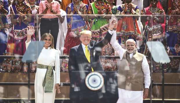 US First Lady Melania Trump, President Donald Trump and Prime Minister Narendra Modi wave at the crowd during u2018Namaste Trump Rallyu2019 at Sardar Patel Stadium in Motera, on the outskirts of Ahmedabad, yesterday.