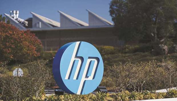 Signage for Hewlett-Packard stands at the companyu2019s headquarters in Palo Alto, California.