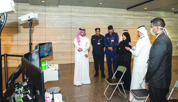 HE the Minister of Public Health Dr Hanan Mohamed al-Kuwari being briefed Tuesday on the equipment and procedures at Hamad International Airport to detect suspected cases of COVID-19.