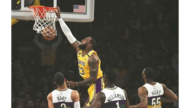 Los Angeles Lakers forward LeBron James dunks the ball during the first-half of their NBA game against the New Orleans Pelicans. in Los Angele.  PICTURE: USA TODAY Sports