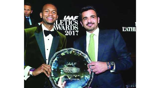 Qatar Olympic Committee President H E Sheikh Joaan bin Hamad Al Thani with Mutaz Essa Barshim after he won the World Athlete of the Year 2017 trophy at the IAAF Awards in Monaco