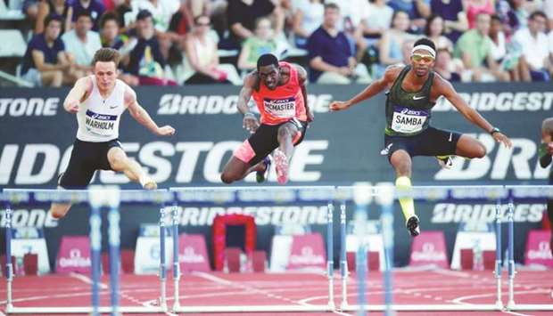 In this June 30, 2018, picture, Qataru2019s Abderrahman Samba (right) is on his way to become only the second man to run the 400m hurdles in under 47 seconds, ahead of British Virgin Islandsu2019 Kyron McMaster and Norwayu2019s Karsten Warholm (left) in Paris. (Reuters)