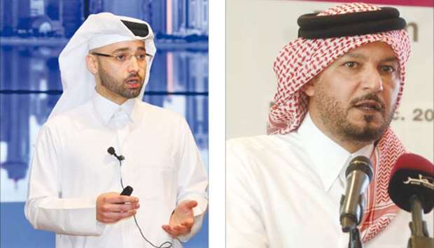 Nasser al-Taweel, adviser to the Minister of Finance (left) and Khamis al-Mohannadi, the chairman of the Technical Committee for the Motivation and Participation of the Private Sector in Economic Development Projects.