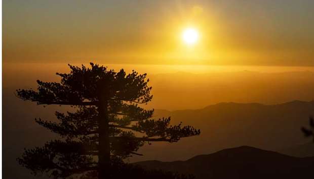 SUNSET: The sun sets in a view west from atop Mt. Disappointment in the San Gabriel Mountains in the Angeles National Forest, California this month.