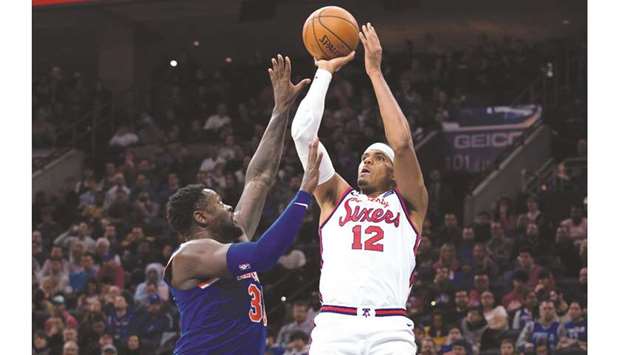 Philadelphia 76ers forward Tobias Harris (right) shoots past New York Knicks forward Julius Randle during the third quarter at Wells Fargo Center. PICTURE: USA TODAY Sports