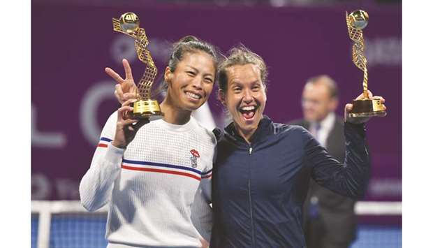 Su-Wei Hsieh (left) of Chinese Taipei and Barbora Strycova of Czech Republic celebrate with their winnersu2019 trophies after winning the Qatar Total Open double title at Khalifa International Tennis and Squash Complex yesterday. PICTURES: Noushad Thekkayil