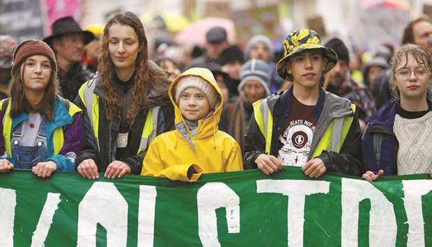 Swedish environmental activist Greta Thunberg and demonstrators attend a youth climate protest in Bristol yesterday.
