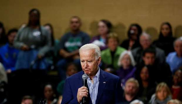 Democratic U.S. presidential candidate and former U.S. Vice President Joe Biden listens as an attendee asks a question during a campaign event at Wofford College in Spartanburg, South Carolina, US