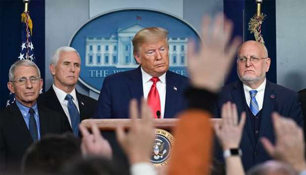 US President Donald Trump takes questions during a press conference on the COVID-19, coronavirus, outbreak at the White House in Washington, DC