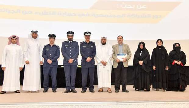 HE the Director of Public Security Staff Major General Saad bin Jassim al-Khulaifi and a number of officials at the Ministry of Interior and other officials with the prize winners. PICTURE: Noushad Thekkayil