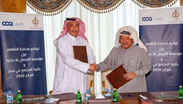 HE the founder and Chairman of Al Faisal Without Borders Foundation Sheikh Faisal bin Qassim Al-Thani and CCQ President Dr. Mohammed Al Naemi shake hands on signing the MoU