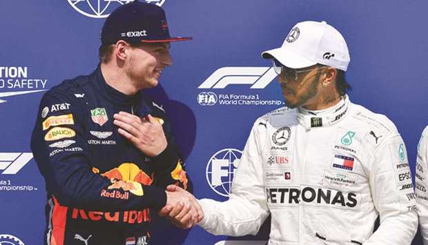 File photo of Red Bullu2019s Max Verstappen with Lewis Hamilton of Mercedes.
