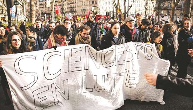 Political science students take part in a demonstration called by several representative workers unions on January 29, 2020 against French government pension reform plans that have raised many protests and multi-sector strikes since early December 2019.