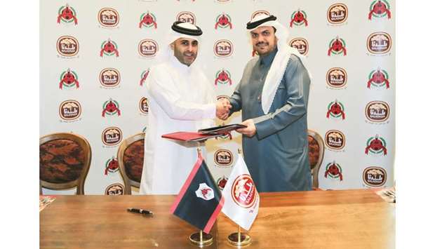 HE Sheikh Ali bin Saud al-Thani, president of Al Rayyan Sports Club and Moutaz al-Khayyat, chairman of Baladna Food Industries seal the sponsorship agreement.