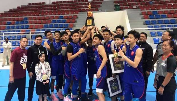 WINNERS: Qataru2019s Junior Falcons squad celebrate with the trophy after winning the 2nd GCC U16 All-Filipino Championship Cup.