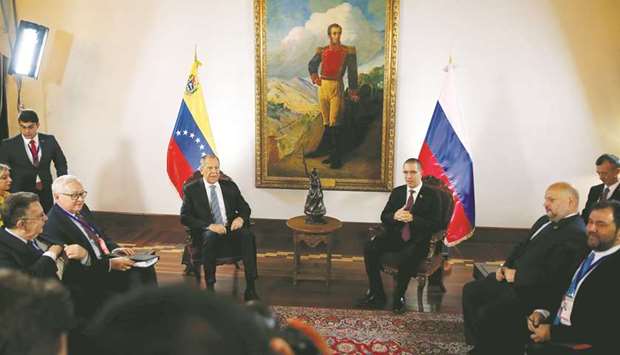 Russiau2019s Foreign Minister Sergei Lavrov and his Venezuelan counterpart Jorge Arreaza attend a meeting in Caracas, Venezuela, yesterday.