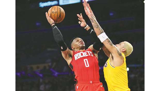 Houston Rockets guard Russell Westbrook (left) moves in for a basket against Los Angeles Lakers forward Kyle Kuzma during the first half at Staples Center. PICTURE: USA TODAY Sports