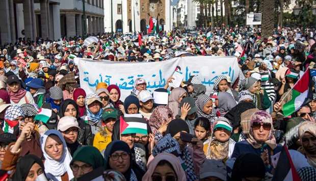 Moroccans march during a demonstration against the US Middle East peace plan in the capital Rabat