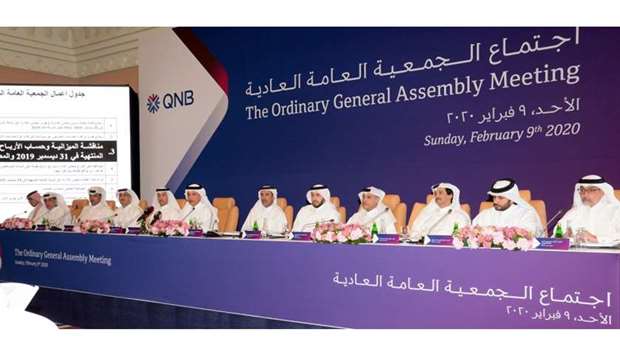 HE al-Emadi engages with shareholders during the QNB's Ordinary General Assembly Meeting held yesterday in Doha. PICTURE: Thajudheen