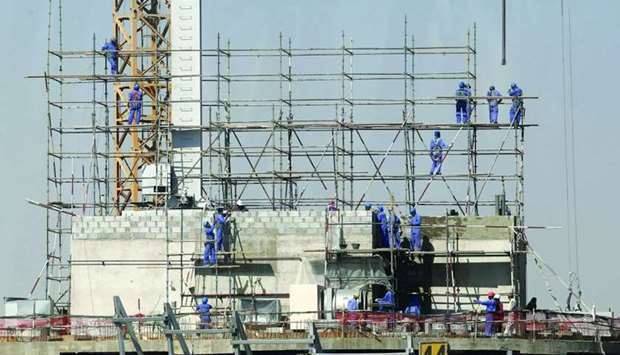 Labourers install scaffolding at a construction site in Doha (file). The PSA data indicates that the new building permits (residential and non-residential) constituted 52% (363 permits) of the total building permits issued in January 2020, while additions constituted 45% (316 permits), and fencing 2% (17 permits).