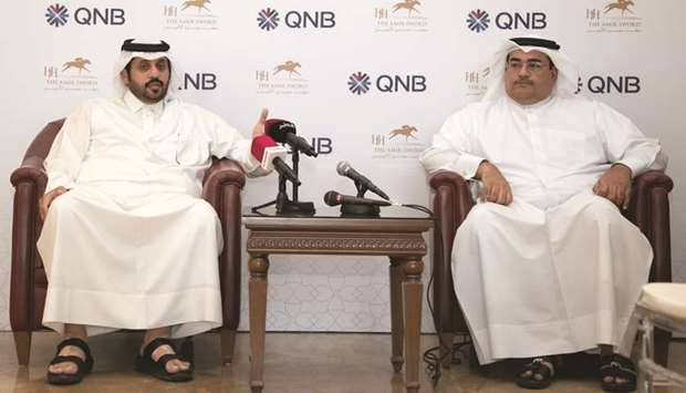 QREC CEO Nasser Sherida al-Kaabi (left) and QNBu2019s General Manager Group Communications Yousef Ali Darwish announced the agreement at a press conference yesterday. PICTURE: Juhaim