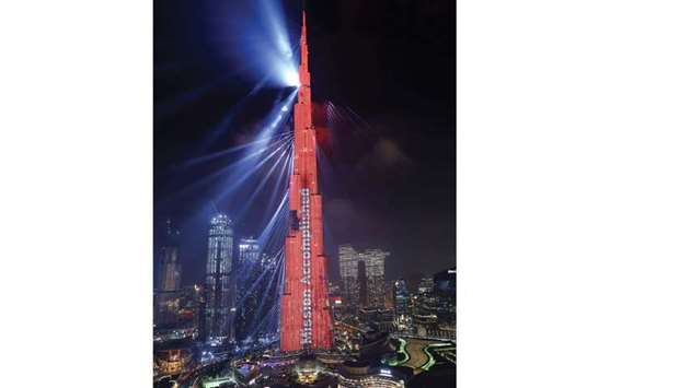 Dubaiu2019s Burj Khalifa is lit up in red with a slogan yesterday as the UAEu2019s u201cHopeu201d probe successfully entered Marsu2019 orbit, making history as the Arab worldu2019s first interplanetary mission.