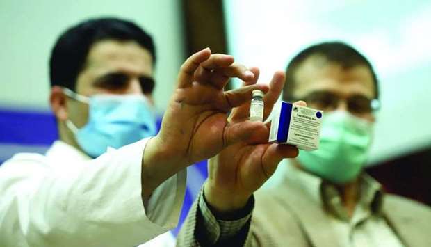 Health officials display vial of Russiau2019s Sputnik V vaccine against the coronavirus disease (Covid-19), at Imam Khomeini Hospital, Tehran on February 9. The road to recovery for the Middle East and Central Asia region will hinge on containment measures, access to and distribution of vaccines, the scope of policies to support growth, and measures to mitigate economic scarring from the pandemic, says Jihad Azour, director, Middle East and Central Asia Department, IMF.