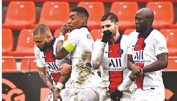 (From left to right) Paris Saint-Germainu2019s Layvin Kurzawa, Presnel Kimpembe, Mauro Icardi and Danilo Pereira jump to stop the ball during the French L1 match against FC Lorient at the Stade ?Yves-Allainmat stadium, in Lorient, western France. (AFP)