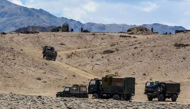 (file photo) Indian army soldiers drive vehicles along mountainous roads as they take part in a military exercise at Thikse in Leh district of the union territory of Ladakh.